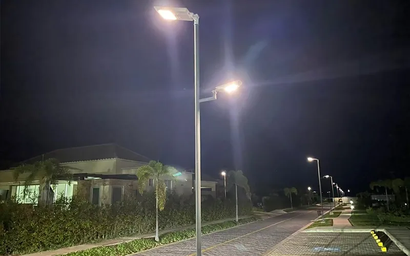 Solar street lights lighting a coastal residential street at night
